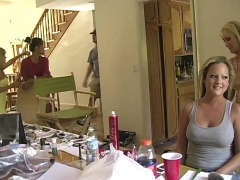 Some behind the scenes clips from the set of a porn movie with interviews