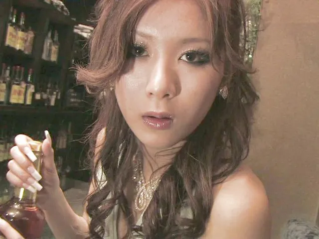 Japanese cutie sucks a dick in the bathroom.