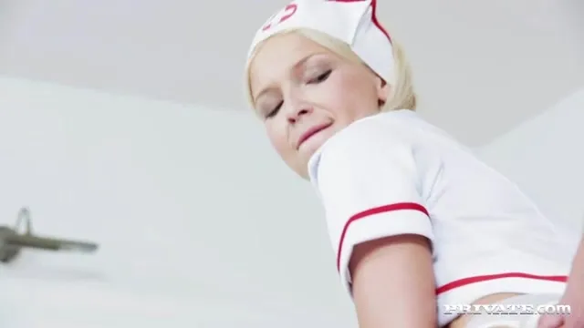 Slutty Nurse Karol Lilien Treats a Patient to Her Warm Pussy