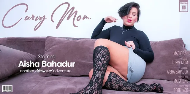 Curvy Mom Aisha is playing with her wet shaved pussy
