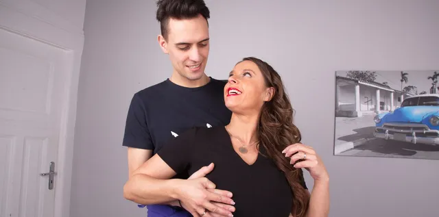 German MILF Susi titty fucks and blows a handsome young man before he pounds her hard