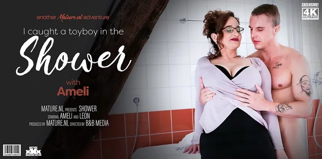 Mature amateur with short hair and glasses and a hairy pussy doing her first solo masturbation movie