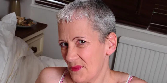 Blonde mature lady with a hairy pussy loves cock in her mouth