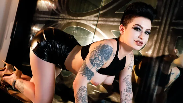 Alluring Kris Riot Masturbates with a Sapphire Blue Dildo
