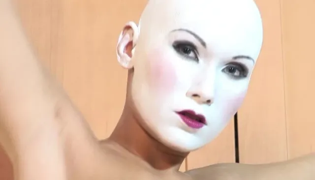 Naked Babe Has Painted Face