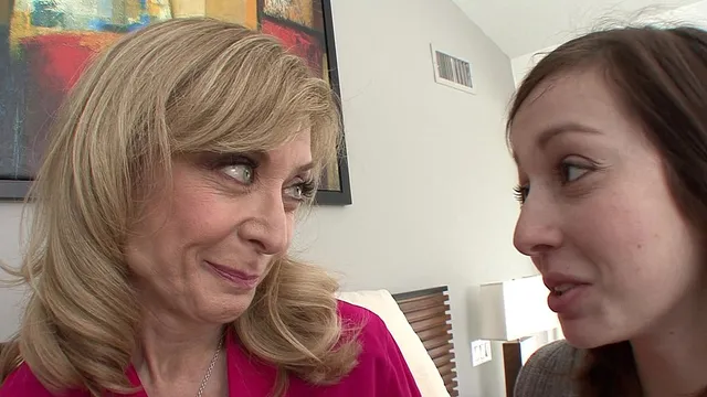 Ally evans is seduced by MILF Nina Hartley to learn how to lick pussy.