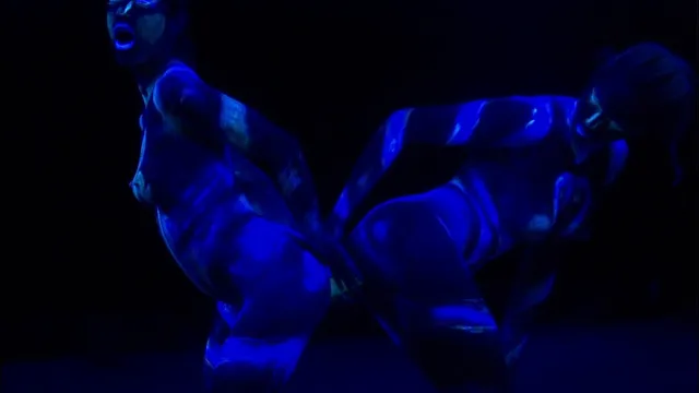 Psycholdelic scene with two hot lesbians fucking in blue