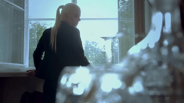Jessie Volt looks stunning as she masturbates in her window