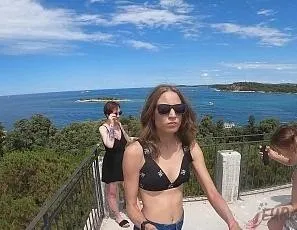 Spending the Day on a Nude Beach Island While on Vacation Sunbathing and Swimming